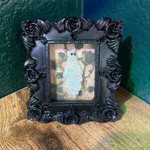 Black Decorative Frame with Ghost Artwork